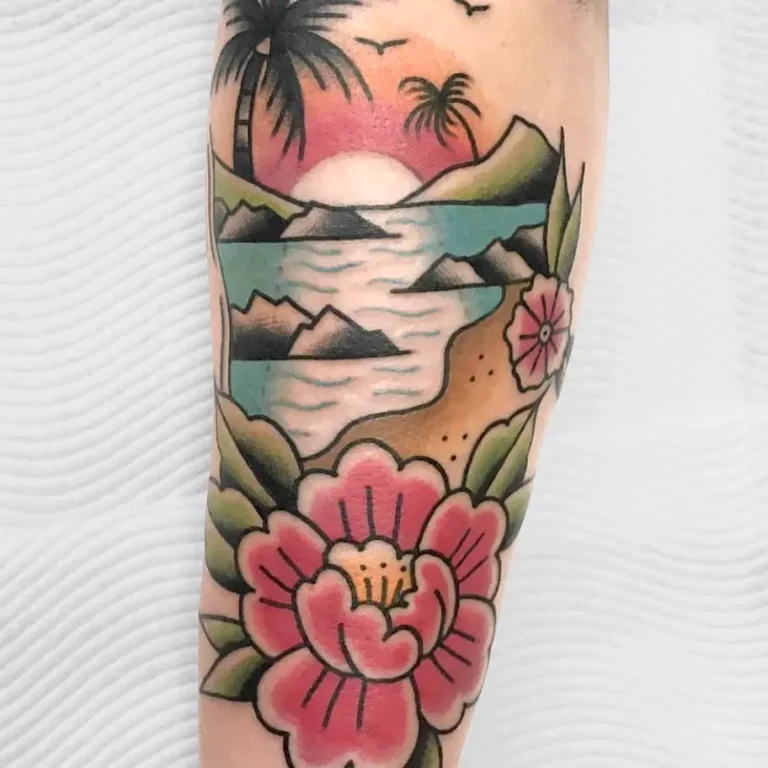 A tattoo of a sunset and flowers on the arm.